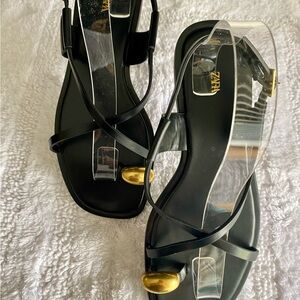 Zara Women's Black Sandals with Gold accent.